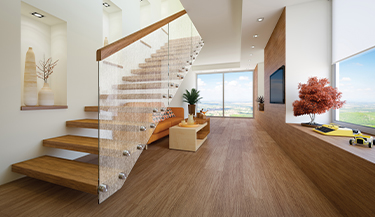 Decorative film adds subtle effect to glass stairs in home 