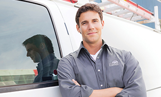 LLumar dealer in front of van 